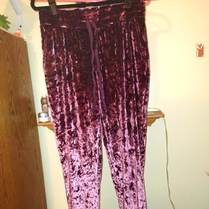 Shiny loose pants.